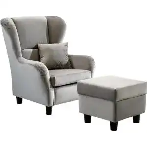 Ohrensessel lifestyle4living mit Hocker in grauem Samt bezogen